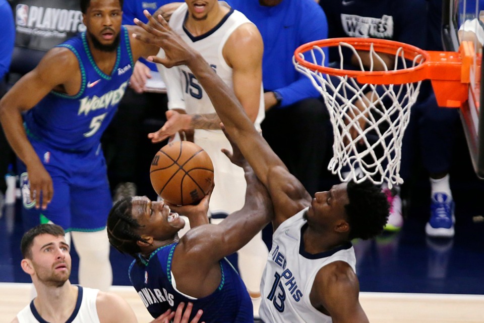 <strong>Minnesota Timberwolves forward Anthony Edwards (1) shoots as Memphis Grizzlies forward Jaren Jackson Jr. (13) defends during the second half in Game 6 of an NBA basketball first-round playoff series Friday, April 29, 2022, in Minneapolis.</strong> (AP Photo/Andy Clayton-King)