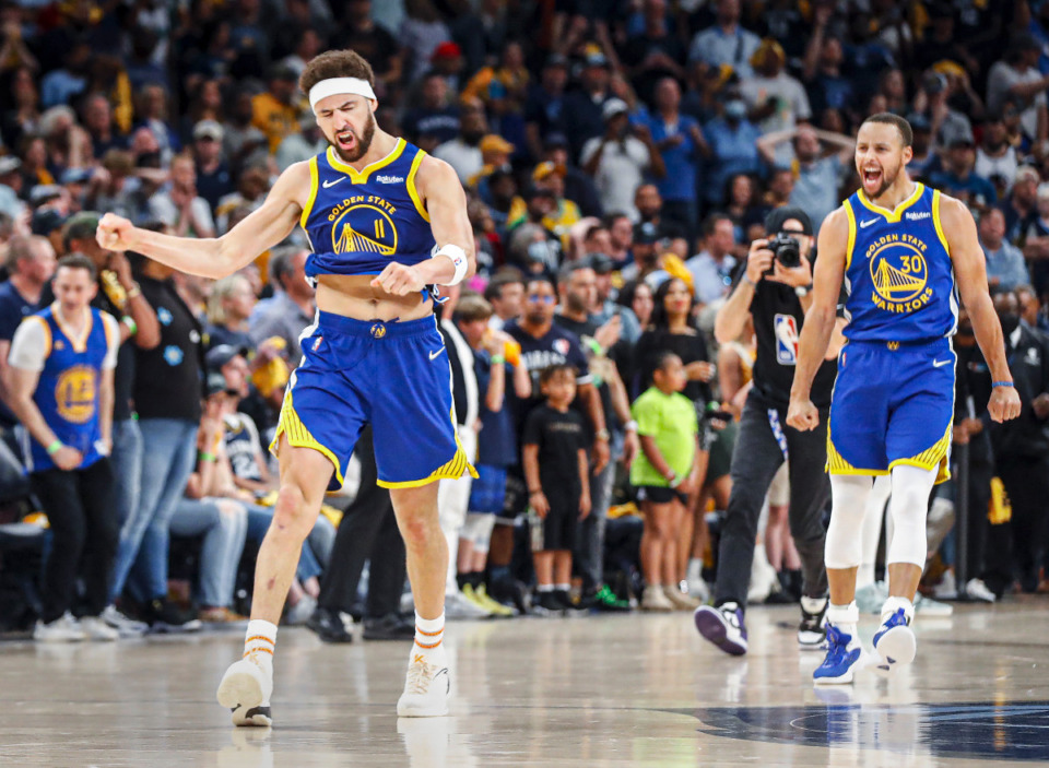 <strong>Golden State Warriors teammates Klay Thompson (left) and Stephen Curry (right) celebrate after beating the Memphis Grizzlies on Sunday, May 1, 2022.</strong> (Mark Weber/The Daily Memphian)