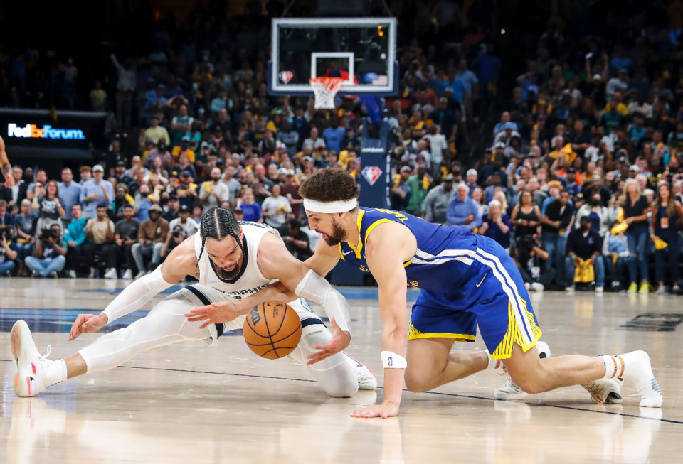 <strong>Memphis Grizzlies defender Dillon Brooks (left) battles Golden State Warriors guard Klay Thompson (right) for a loose ball on Sunday, May 1, 2022.</strong> (Mark Weber/The Daily Memphian)