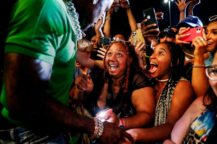 <strong>Fans react after getting close to the DaBaby during the first day of Beale Street Music Fest on Friday, April 29, 2022, at Liberty Park.</strong> (Mark Weber/The Daily Memphian)