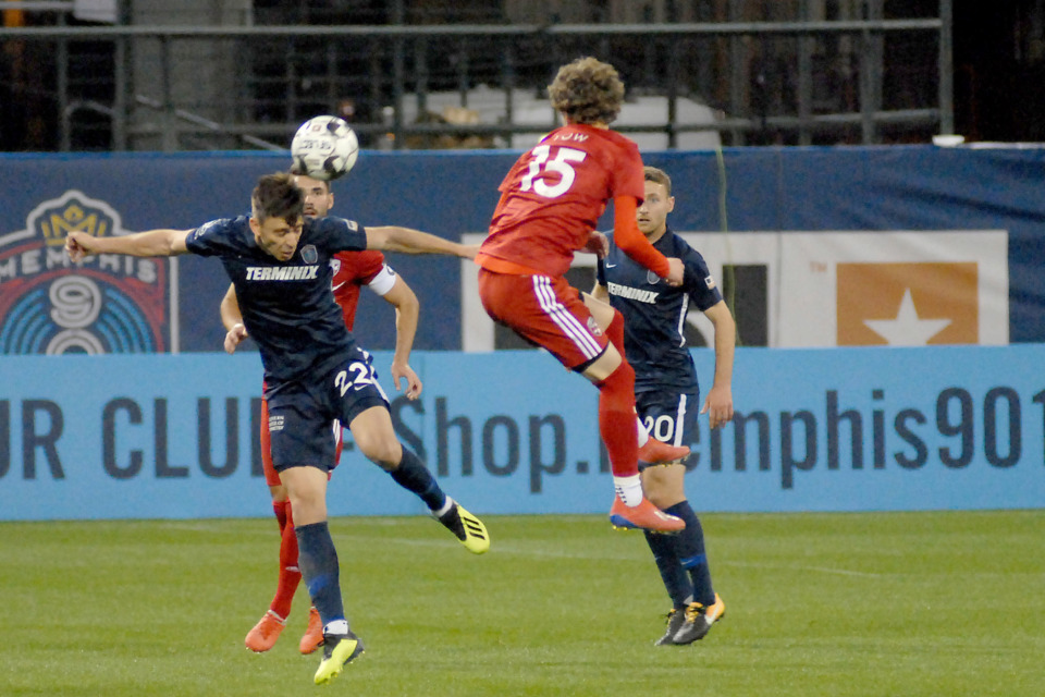<strong>Memphis 901 FC defender Wes Charpie (#22) deflects the ball back to midfield during the first half of a match against Loudon United on Saturday, March 16, 2017, at AutoZone Park. The match ended in a 1-1 tie.</strong> (Stan Carroll/Special to The Daily Memphian)