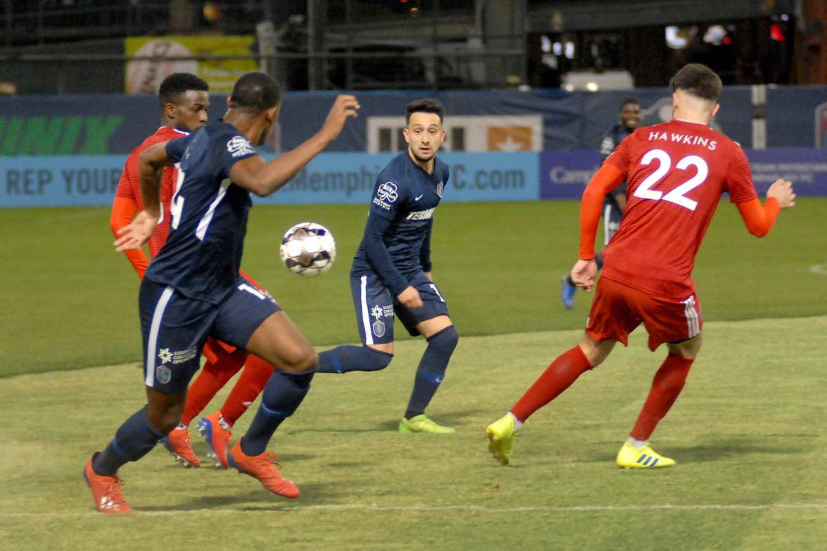<strong>Memphis 901 FC players Adam Najem (#10) and Rashawn Dally (#14) work the ball toward the goal durng a match against Loudoun United on Saturday, March 16, 2019, at AutoZone Park in Memphis. The match ended in a 1-1 tie.</strong> (Stan Carroll/Special to The Daily Memphian)