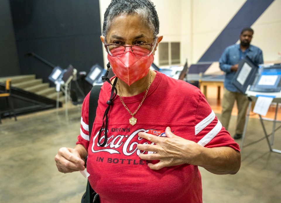 <strong>Toni M. Wooten puts on her "I Voted" sticker as she leaves her poling place at Hope Church, on Tuesday, May 3, 2022.</strong> (Greg Campbell/Special to The Daily Memphian)