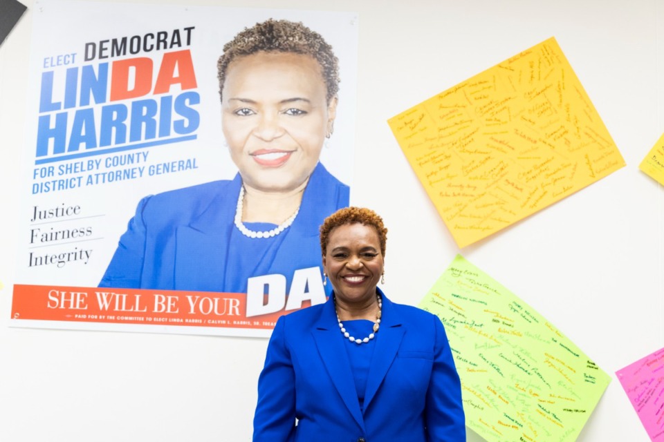 <strong>Linda Harris stands before a campaign poster in her primary race for Shelby County district attorney.</strong> (Brad Vest/Special to The Daily Memphian)