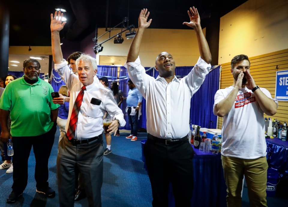 <strong>Shelby County District Attorney Democratic primary candidate Steve Mulroy (left) and Shelby County Mayor Lee Harris (right) celebrate election returns at&nbsp; a watch party on Tuesday, May 3, 2022.</strong> (Mark Weber/The Daily Memphian)