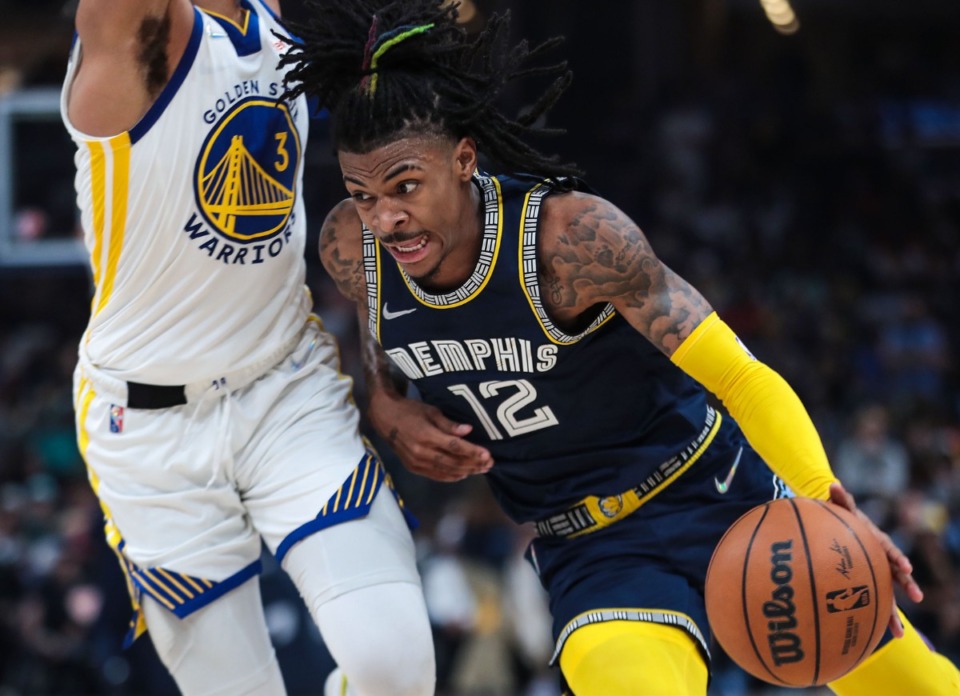 <strong>Memphis Grizzlies guard Ja Morant (12) drives to the basket against the Golden State Warriors on May 3.</strong> (Patrick Lantrip/Daily Memphian)