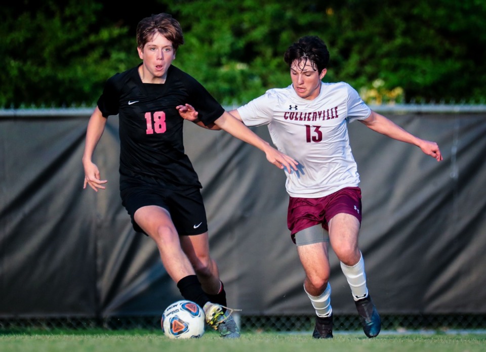 <strong>Houston&rsquo;s Dylan Henry (18) and Collierville&rsquo;s Joey Salazar (13) battle for position on May 4.</strong> (Patrick Lantrip/Daily Memphian)