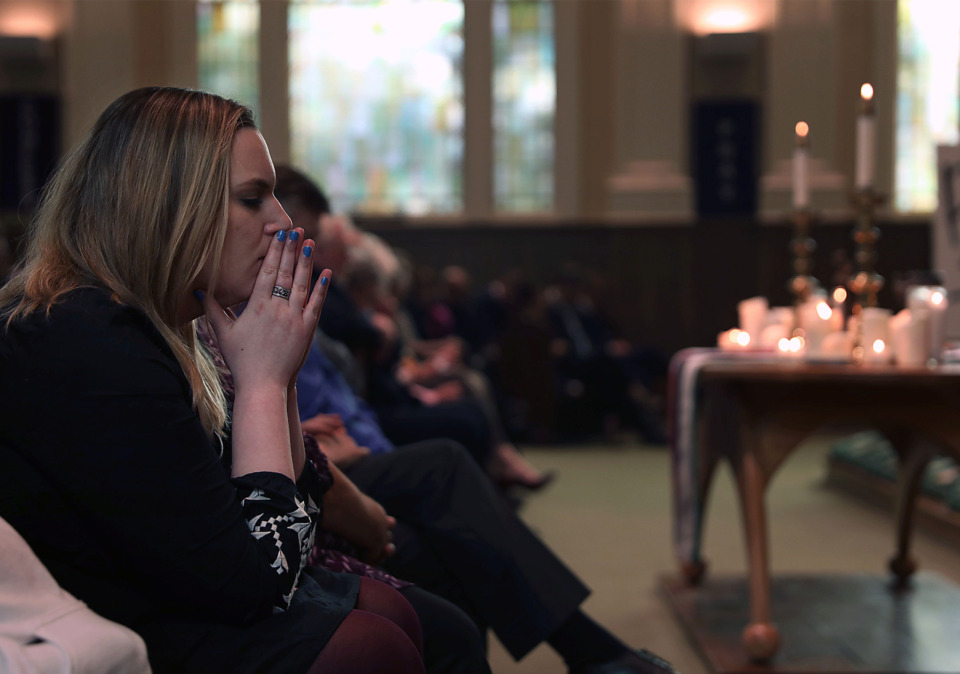 <strong>Annie Hunter, director of communications and volunteer development with St. John&rsquo;s United Methodist Church, takes a moment to reflect during the funeral of former Memphis State University basketball player, rock star and Methodist minister John Kilzer on Monday, March 18.</strong> (Patrick Lantrip/Daily Memphian)