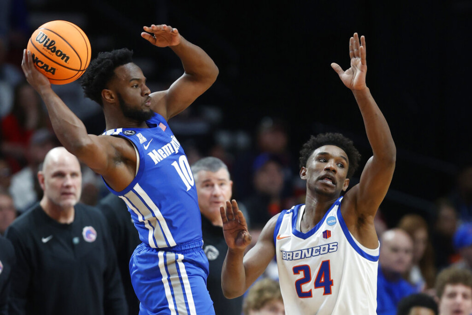 <strong>Memphis guard Alex Lomax, seen here in March, is projected to return to the Tigers.</strong> (Craig Mitchelldyer/AP file)