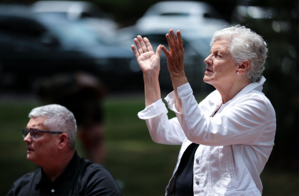 <strong>Helen Burnett of Olive Branch prays during a National Day of Prayer event held at Collierville Town Square. The task force chose the theme of&nbsp;&ldquo;Exalt the Lord who established us&rdquo; based on Colossians 2.</strong> (Patrick Lantrip/Daily Memphian)