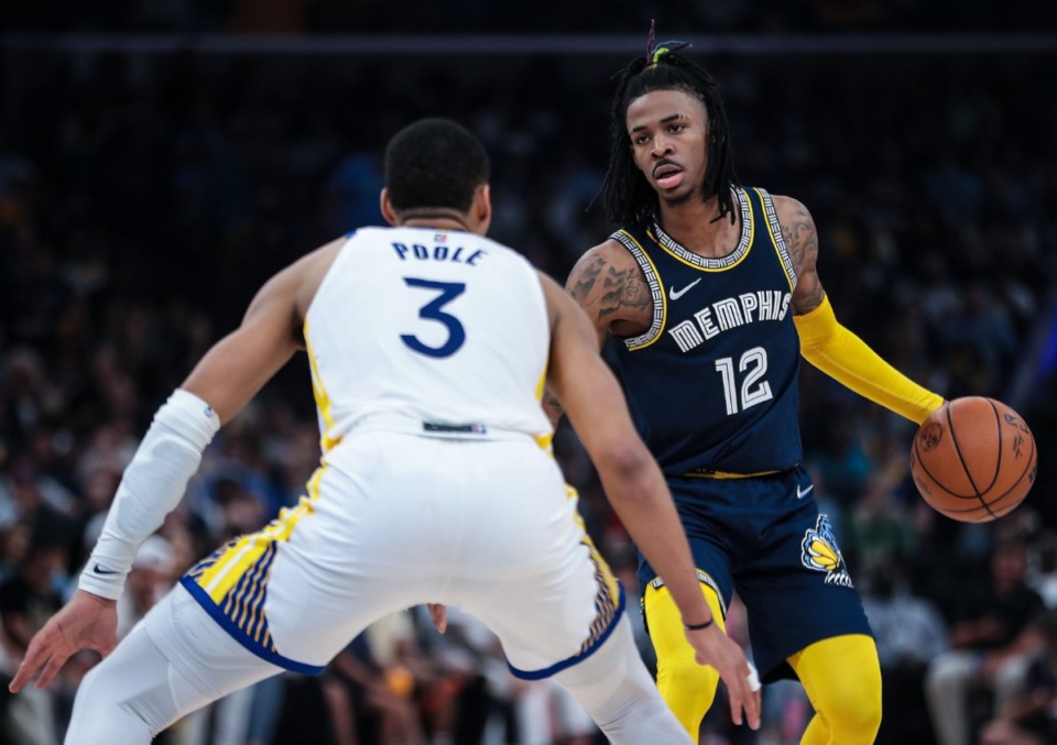 <strong>Memphis Grizzlies guard Ja Morant (12) brings the ball up the court during a May 3, 2022 playoff game against the Golden State Warriors in Memphis, Tennessee.</strong> (Patrick Lantrip/Daily Memphian)
