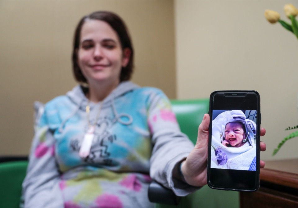 <strong>Tracy Edwards shows off a picture of her daughter, Ember, who was born prematurely and is currently in the NICU unit at Regional One in Memphis, through the NICVIEW app.</strong>&nbsp;(Patrick Lantrip/Daily Memphian)