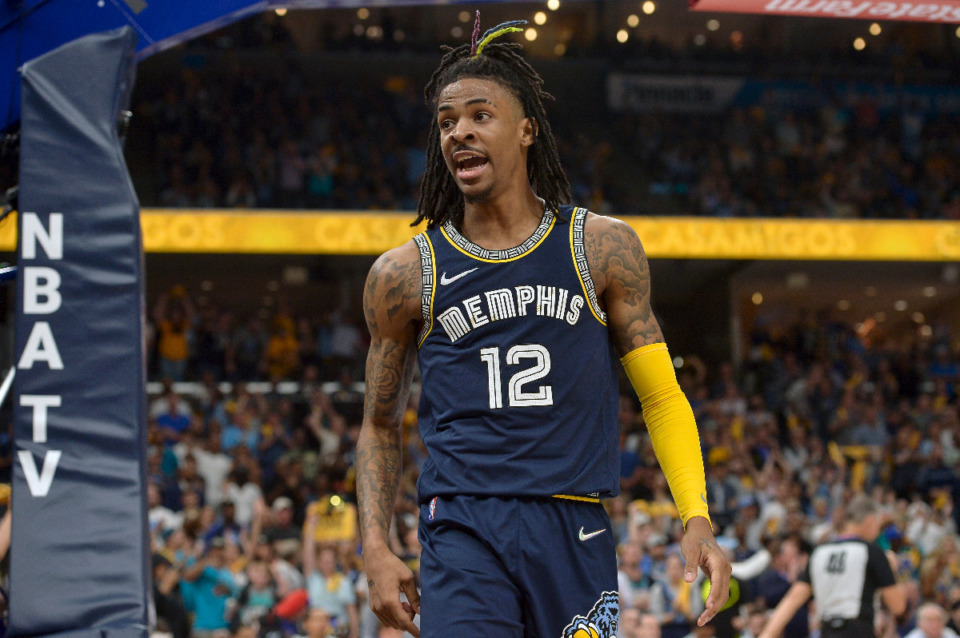 <strong>Memphis Grizzlies guard Ja Morant (12) reacts in the second half during Game 2 of a second-round NBA basketball playoff series against the Golden State Warriors Tuesday, May 3, 2022, in Memphis.</strong> (AP Photo/Brandon Dill)