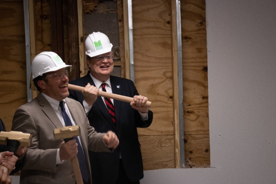 <strong>Memphis Parks Director Nick Walker (left) and Mayor Jim Strickland prepare to demolish a wall inside Gaston Community Center on Monday, May 9.</strong> (Daja E. Henry/Daily Memphian)
