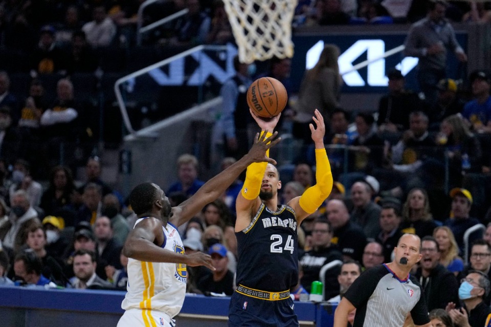 <strong>Memphis Grizzlies forward Dillon Brooks (24) takes a 3-point shot over Golden State Warriors forward Draymond Green, left, on May 9, 2022. He took a lot of shots, and missed most of them.</strong> (Tony Avelar/AP)