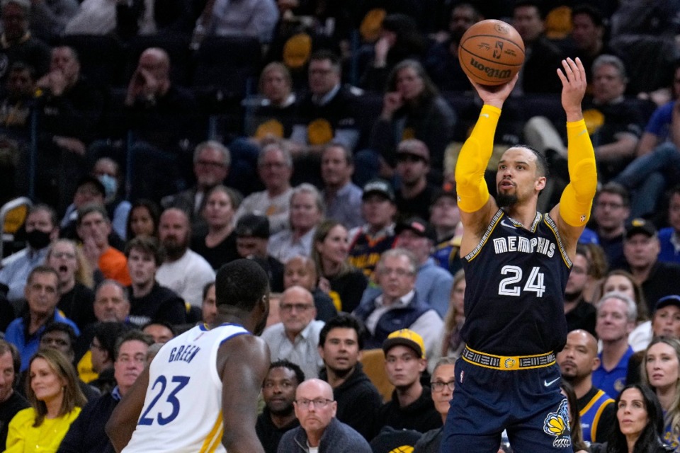 <strong>Memphis Grizzlies guard Dillon Brooks (24) shoots over Golden State Warriors forward Draymond Green (23) during the second half of Game 4 of an NBA basketball Western Conference playoff semifinal in San Francisco, Monday, May 9, 2022.</strong> (AP Photo/Tony Avelar)