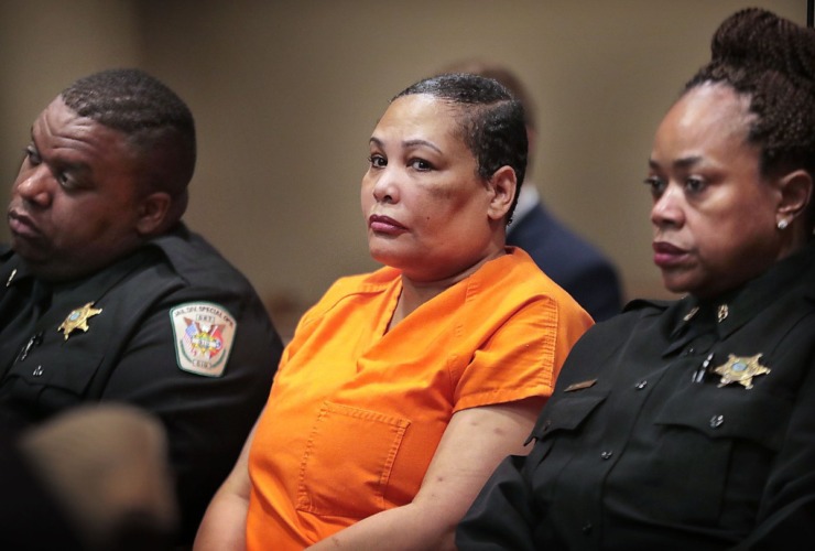 Sherra Wright (center) listens to arguments during a hearing in Judge Lee Coffee's court on May 30, 2019. Wright appeared before a parole board on Wednesday, May 11. (Daily Memphian file)
