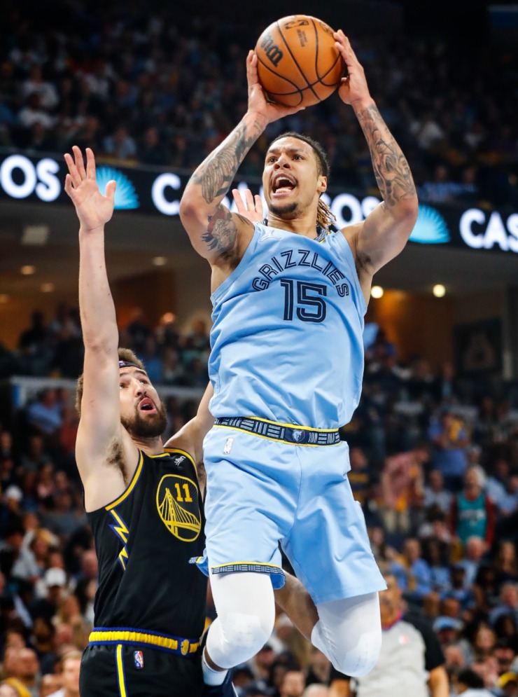 <strong>Memphis Grizzlies forward Brandon Clarke (right) drives the lane against Golden State Warriors defender Klay Thompson (left) during action on Wednesday, May 11, 2022.</strong> (Mark Weber/The Daily Memphian)