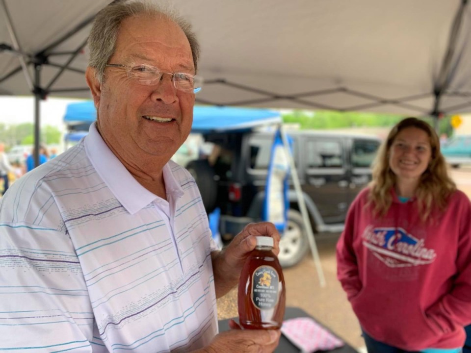 <strong>Ellis Koonce and Heather Selvy, with Caney Creek Honey, have been vendors at the Hernando Farmers Market.</strong> (Courtesy of the City of Hernando)