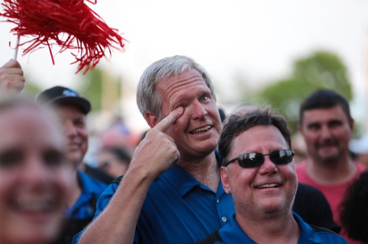 <strong>Members of the All-Star Ten Pin Porkers react to winning in The Home Depot Best Booth competition during the second day of the Memphis in May World Championship Barbecue Cooking Contest on May 12, 2022.</strong> (Patrick Lantrip/Daily Memphian)