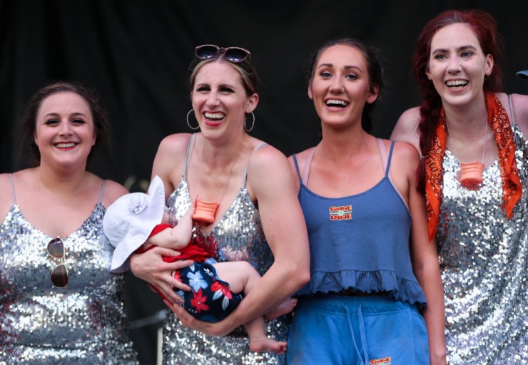 <strong>The dancers from the Swine and Dine tent accept their award for the Miss Piggy Idol competition during the second day of the Memphis in May World Championship Barbecue Cooking Contest on May 12, 2022.</strong> (Patrick Lantrip/Daily Memphian)