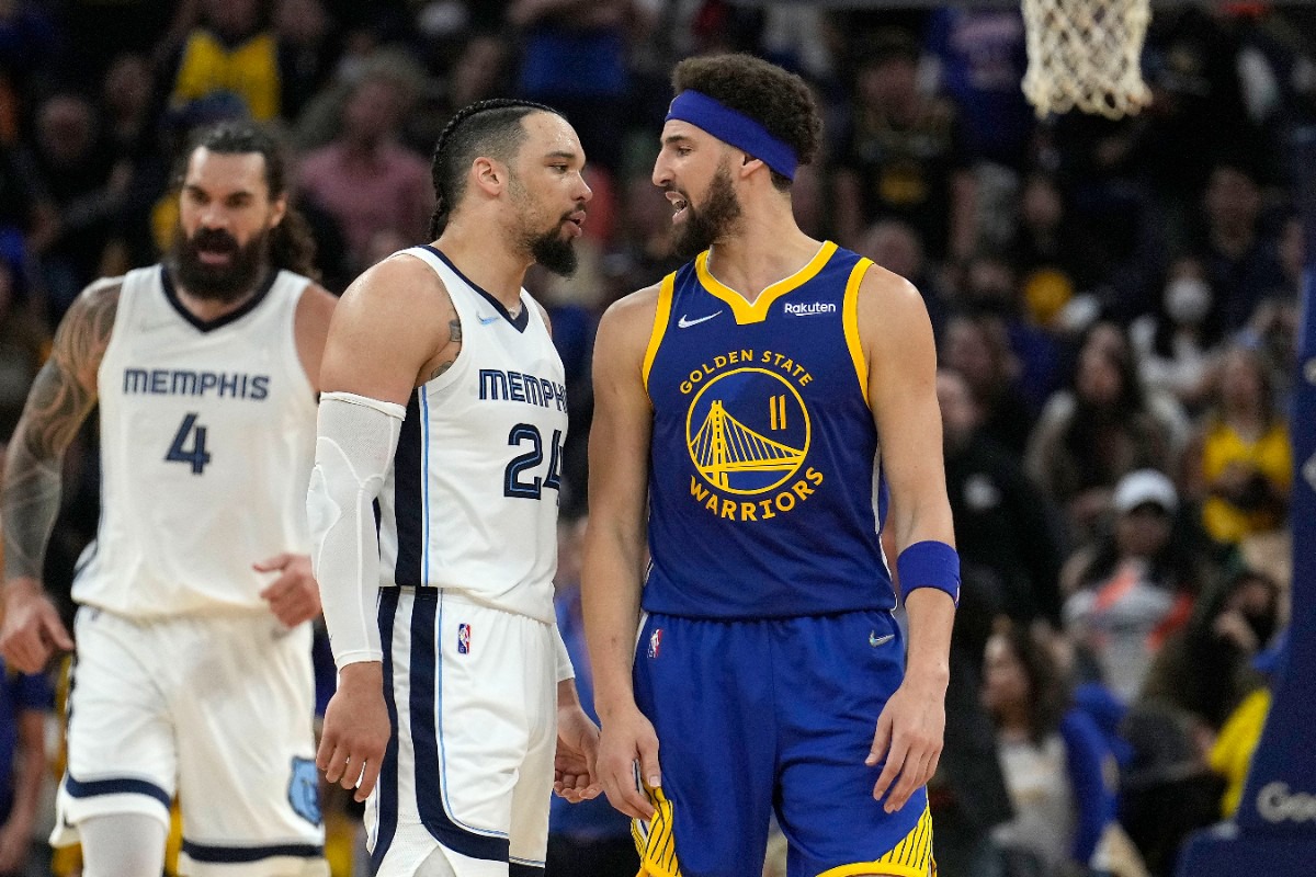 <strong>Golden State Warriors guard Klay Thompson (11) and Memphis Grizzlies forward Dillon Brooks (24) exchange words during Game 6 on Friday, May 13, 2022.</strong> (Tony Avelar/AP)