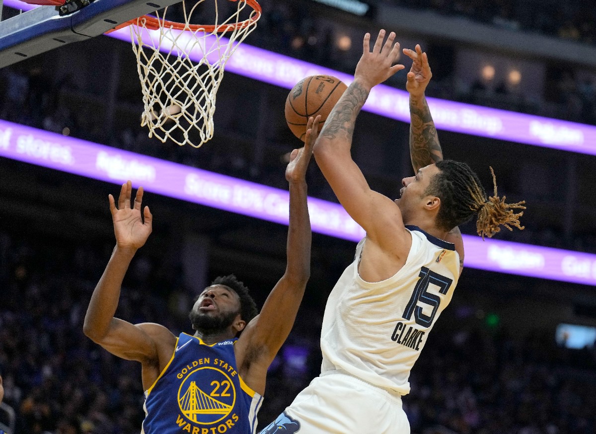 <strong>Golden State Warriors forward Andrew Wiggins (22) competes for a rebound against Memphis Grizzlies forward Brandon Clarke (15) on May 13, 2022.</strong> (Tony Avelar/AP)