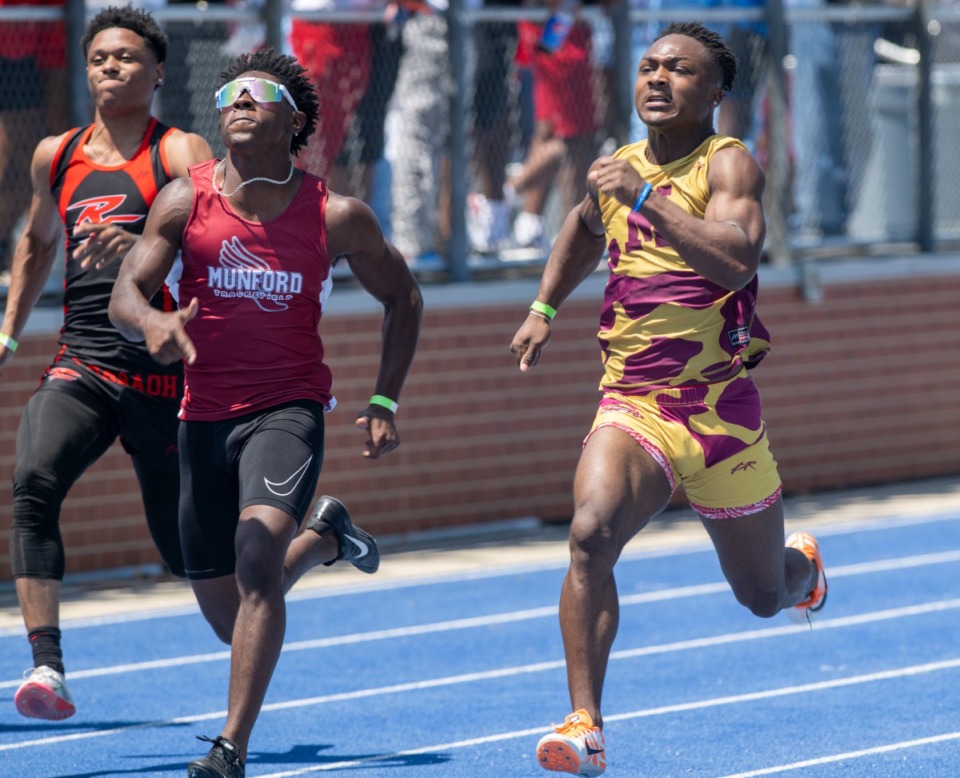 <strong>Braxton Sharp of Munford High School won the AA boys 100m dash beating out Jermaine Dodson of Melrose High School by just .03 sec at the TSSAA Section Track Meet held at Bartlett High School, Saturday, May 14, 2022.</strong> (Greg Campbell/Special to The Daily Memphian)