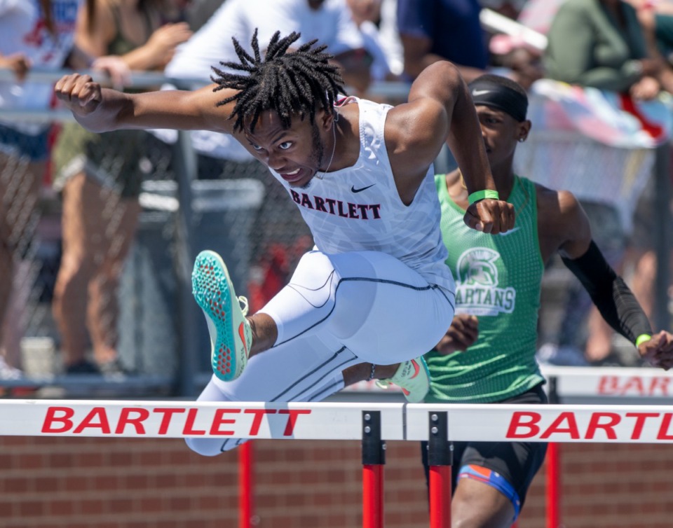 <strong>Kylan Bernard of Bartlett High School finished ahead of White Station High School's Shamari Covington in the boys 110m hurdles at the TSSAA Section Track Meet held at Bartlett High School, Saturday, May 14, 2022.</strong> (Greg Campbell/Special for The Daily Memphian)