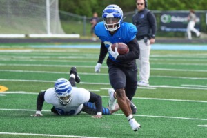 <strong>Brandon Thomas runs past William Whitlow Jr. during the Memphis Tigers spring scrimmage at Centennial High School on April 02, 2022 in Franklin, Tennessee.</strong> (Harrison McClary/Special to The Daily Memphian)