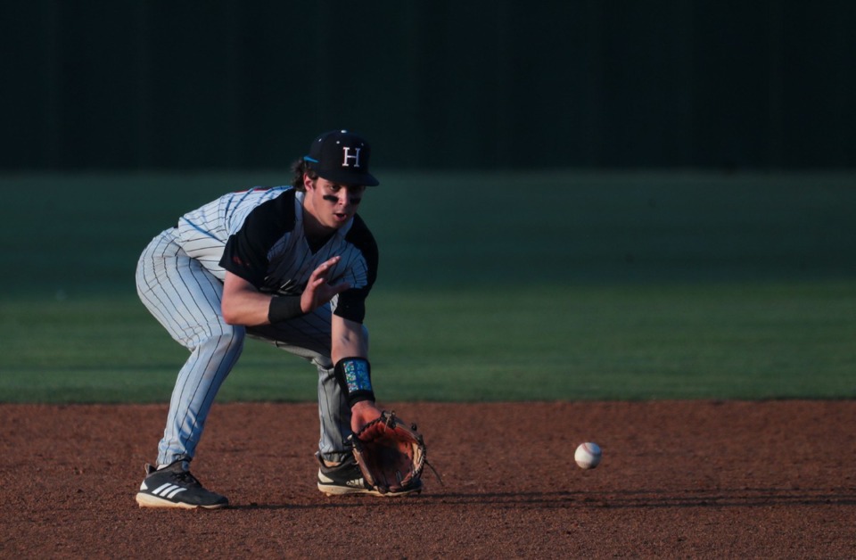 <strong>Houston shortstop Tyler Yearwood (12) fields the ball on May 18 in the game game against Collierville.</strong> (Patrick Lantrip/Daily Memphian)