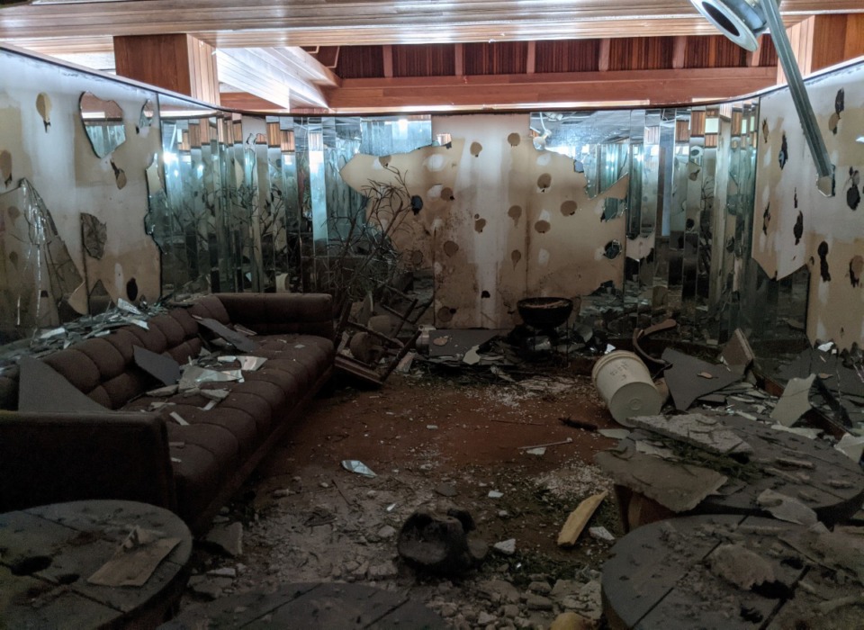 <strong>A once-luxurious private lounge is filled with broken glass and trash.</strong> (Neil Strebig/The Daily Memphian)