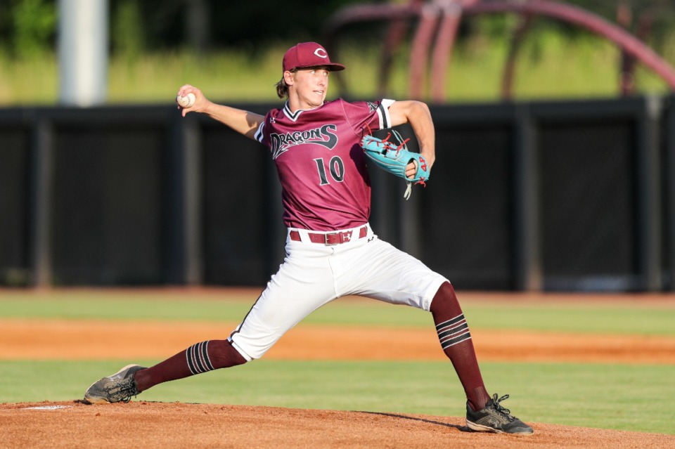 <strong>Collierville&rsquo;s Grayson Saunier throws a pitch against the Henry County Patriots on Friday, May 20, 2022.</strong> (Justin Ford/ Special to The Daily Memphian)