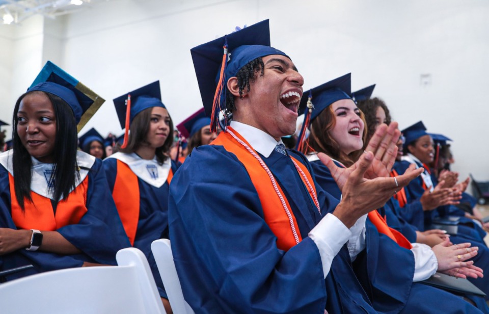 <strong>Crosstown High seniors react to a classmate's speech during the school's first-ever graduation ceremony May 21, 2022.</strong> (Patrick Lantrip/Daily Memphian)