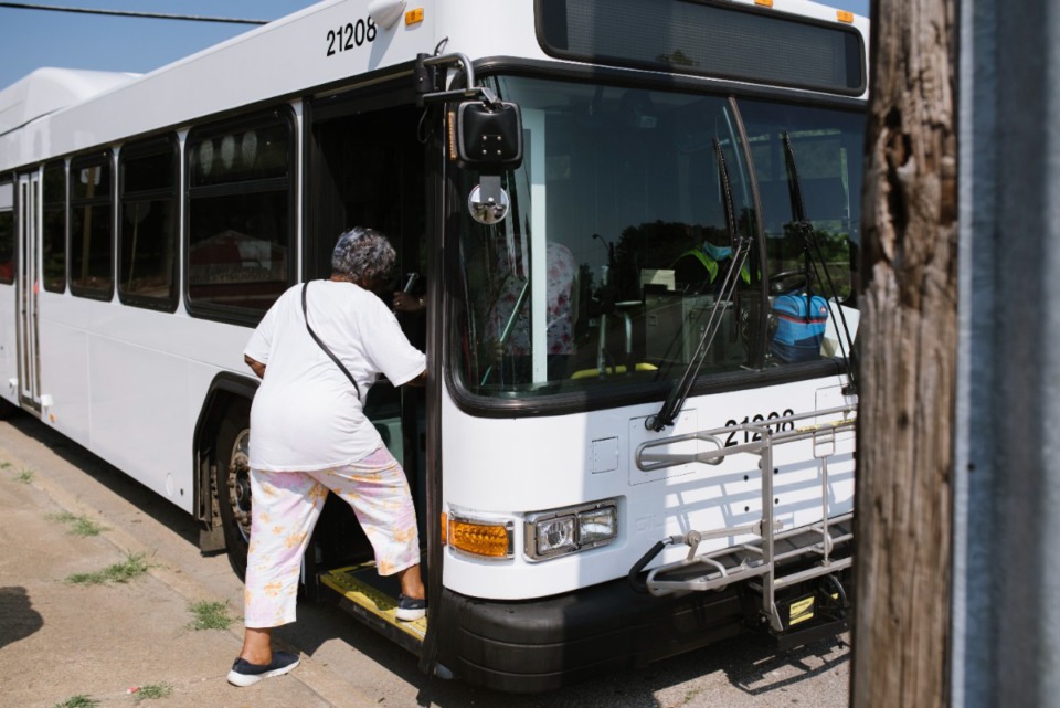 <strong>A passenger (in a July 2021 file photo) boards a MATA bus providing service from the Klondike and Smokey City neighborhood to Downtown Farmers Market. Shelby County commissioners have a proposal that will provide $30 million in annual funding for the city bus system&rsquo;s &ldquo;Transit Vision&rdquo; Plan.</strong> (Lucy Garrett/Special to The Daily Memphian file)