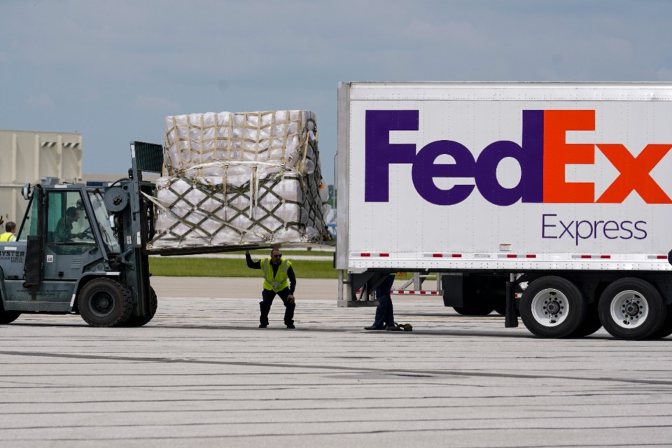 <strong>A pallet of baby formula is loaded into a truck after arriving on an Air Force C-17 at the Indianapolis International Airport, Sunday, May 22, 2022. The 132 pallets of Nestl&eacute; Health Science Alfamino Infant and Alfamino Junior formula arrived from Ramstein Air Base in Germany.</strong> (AP Photo/Michael Conroy)
