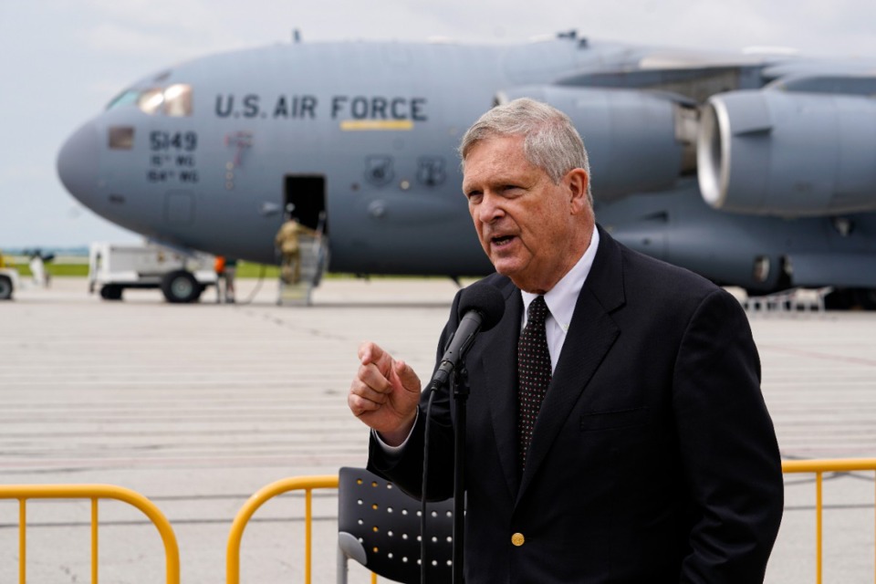 <strong>Agriculture Secretary Tom Vilsack speaks after an Air Force C-17 delivered a planeload of baby formula at the Indianapolis International Airport, Sunday, May 22, 2022.</strong> (AP Photo/Michael Conroy)