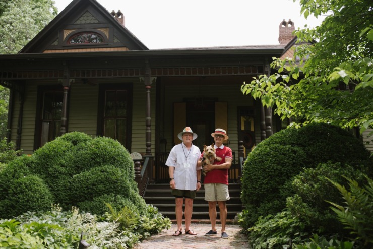 <strong>Kerry Palmertree (left) and Randle Witherington (with their dog Augustine) said their home was built in 1887 and is one of the oldest houses in the neighborhood.</strong> (Lucy Garrett/Special to The Daily Memphian)
