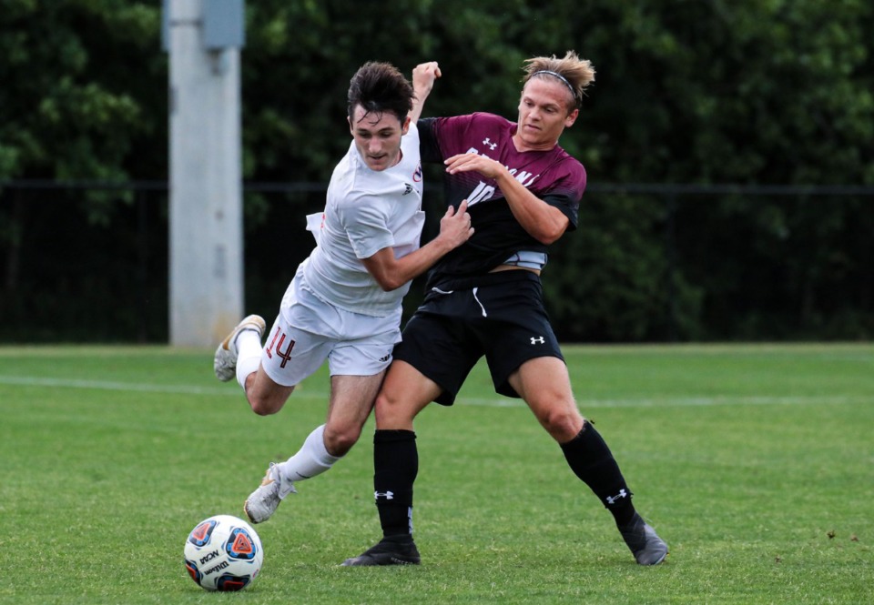 <strong>Collierville junior Micah Soper (10) fights for the ball during the state championship tournament match against Knoxville West on May 24 in Murfreesboro, Tennessee.</strong> (Patrick Lantrip/Daily Memphian)