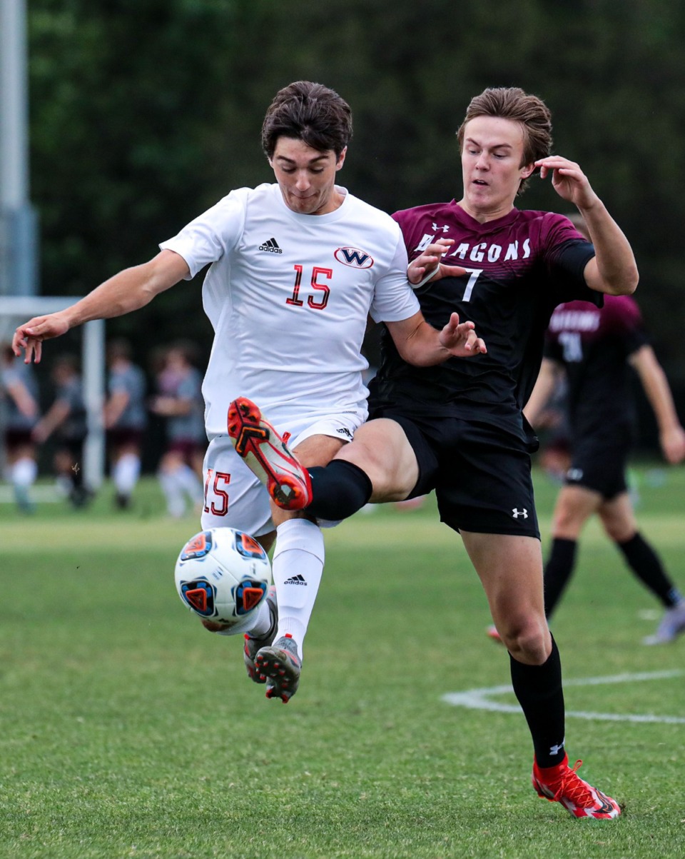 <strong>Collierville junior Luke Johnson (7) fights for the ball during the state championship tournament match against Knoxville West on May 24 in Murfreesboro, Tennessee.</strong> (Patrick Lantrip/Daily Memphian)