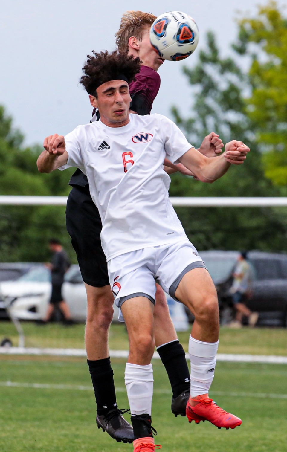 <strong>Collierville senior Caleb Bayha (3) goes for a header during the state championship tournament match against Knoxville West on May 24 in Murfreesboro, Tennessee.</strong> (Patrick Lantrip/Daily Memphian)