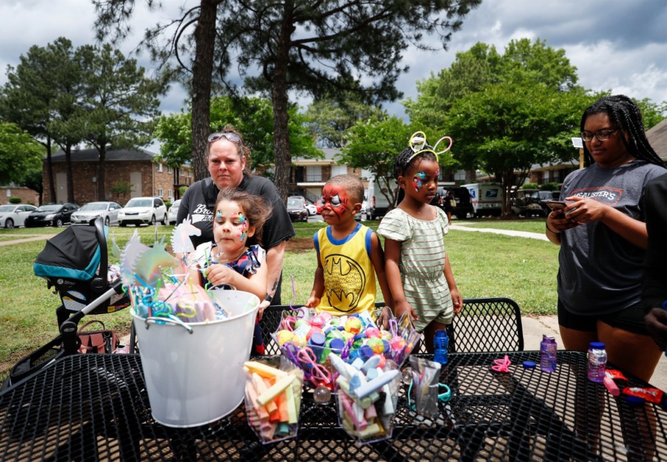 <strong>Kensington Manor residents and their children attend a grand reopening ceremony on Thursday, May 26, 2022.</strong> <strong>After a $19 million renovation, the 558 units of the complex are renovated and ready for occupancy.&nbsp;</strong>(Mark Weber/The Daily Memphian)