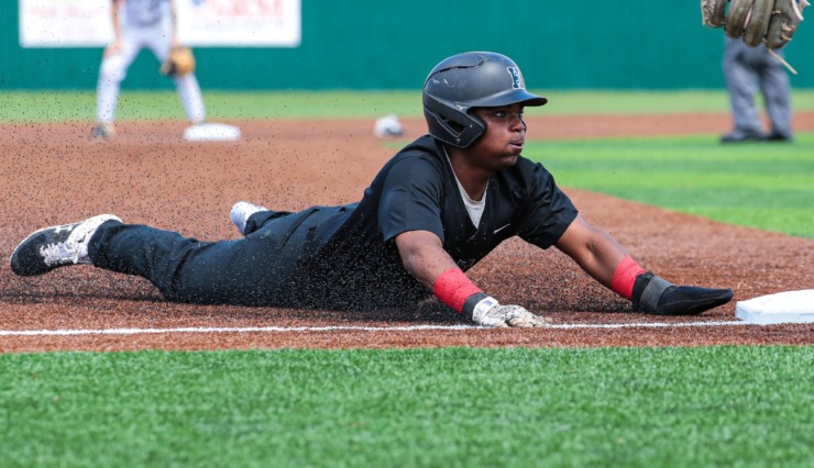 <strong>Houston outfielder Robinson Martin (2) slides into third in the Class 4A State Baseball championship game in Murfreesboro, Tennessee May 28, 2022.</strong> (Patrick Lantrip/Daily Memphian)