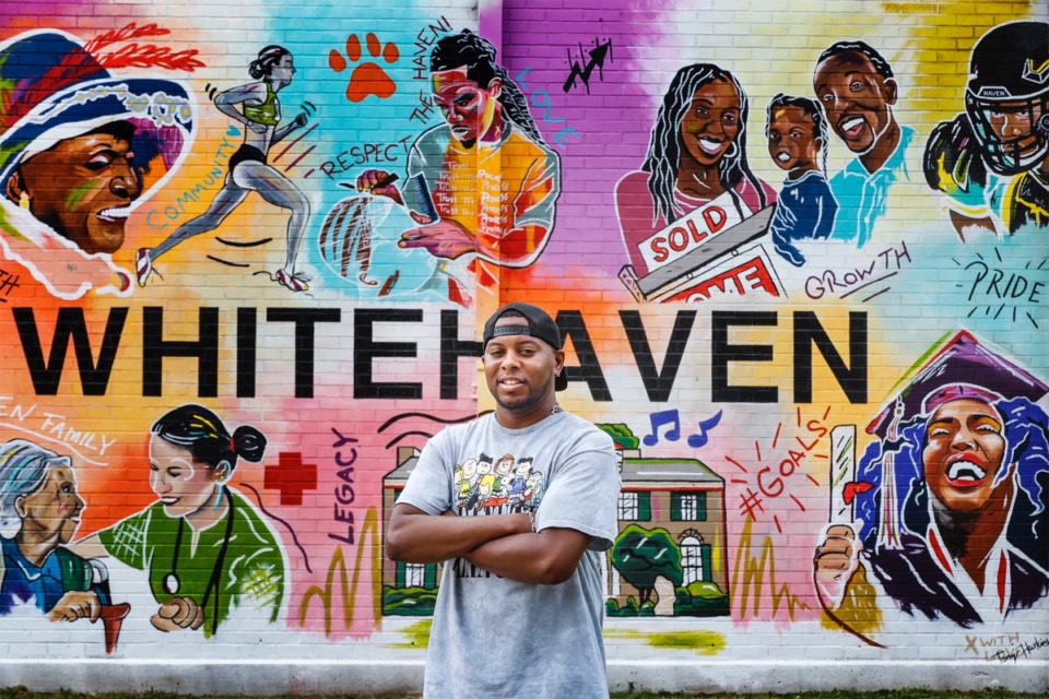 <strong>Artist Tony Hawkins stands by a mural he recently completed at Whitehaven Community Center on Tuesday, May 23, 2022. Hawkins, has been selected to complete a mural in his neighborhood of Westwood.</strong> (Mark Weber/The Daily Memphian)