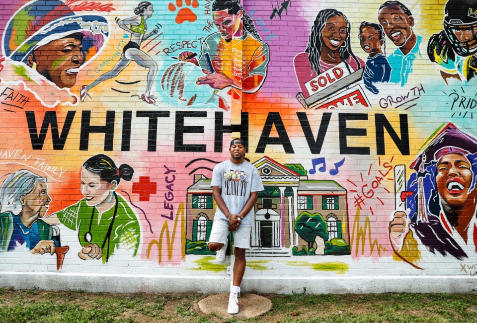<strong>Artist Tony Hawkins stands by a mural he recently completed at Whitehaven Community Center on Tuesday, May 23, 2022. Hawkins, has been selected to complete a mural in his neighborhood of Westwood. </strong>(Mark Weber/The Daily Memphian)