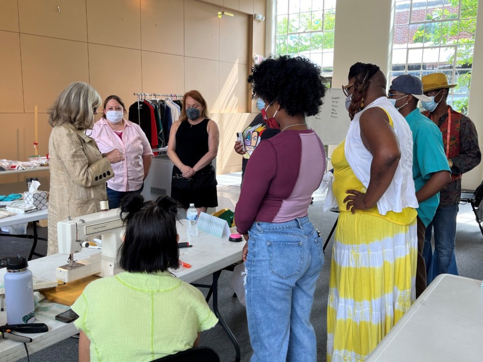 <strong>Kat Farris, a professional tailor, shows students how to &ldquo;speed sew&rdquo; on a button during the Film and Television Commission&rsquo;s two-day Sewing for Film and Television Workshop held in April.</strong>&nbsp;<strong>The organization will host a set-building worksop in June.&nbsp;</strong>(The Memphis &amp; Shelby County Film and Television Commission)