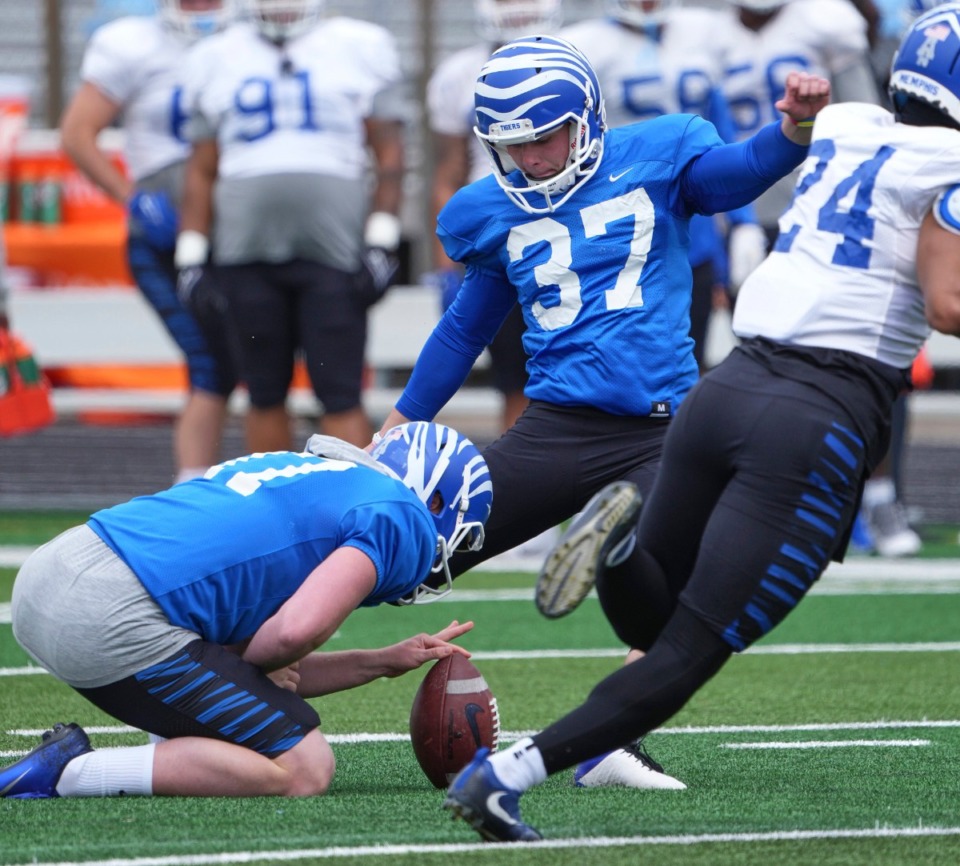<strong>David Kemp kicks a point during the Memphis Tigers spring scrimmage at Centennial High School on April 02, 2022 in Franklin, Tennessee.</strong> (Harrison McClary/Special to The Daily Memphian file)