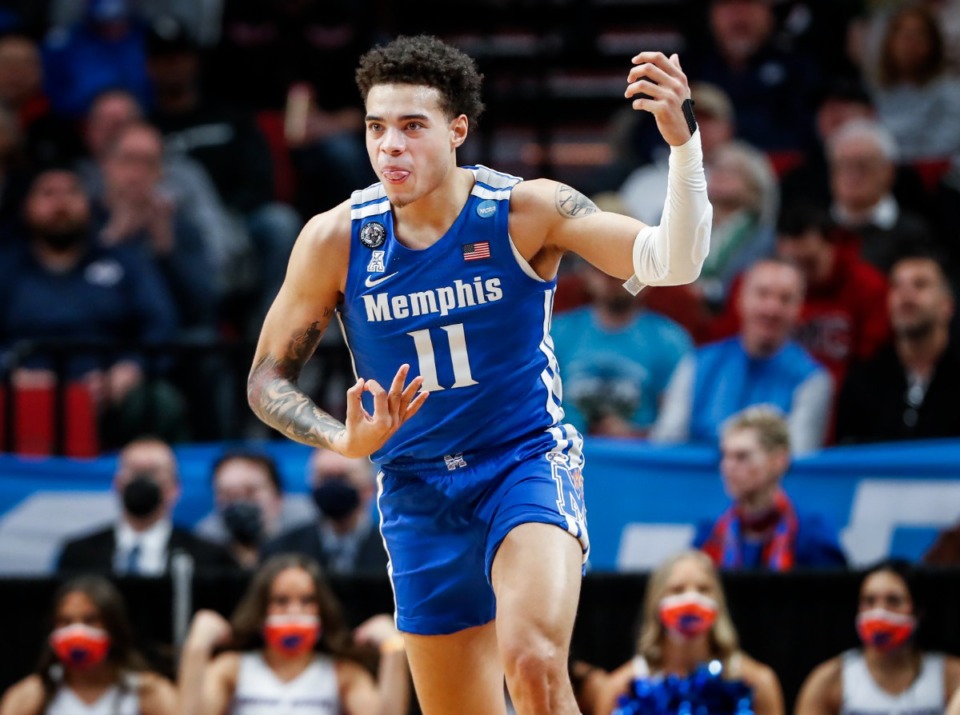<strong>Tigers guard Lester Quinones celebrates a 3-pointer on March 17, 2022.</strong> (Mark Weber/The Daily Memphian file)