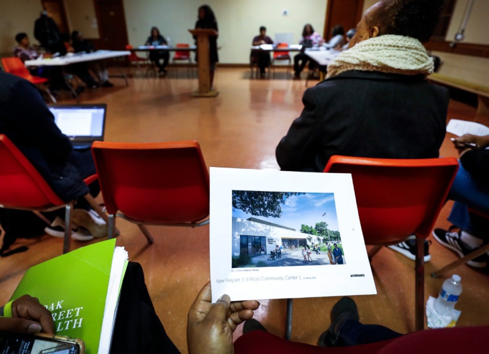 <strong>Renderings of the new Ed Rice Community Center are passed around during a Frayser Community Association meeting Monday, Feb. 17, 2020.&nbsp;The center underwent an&nbsp;$8.4 million&nbsp;renovation that took almost two years.&nbsp;</strong>&nbsp;(Mark Weber/Daily Memphian file)