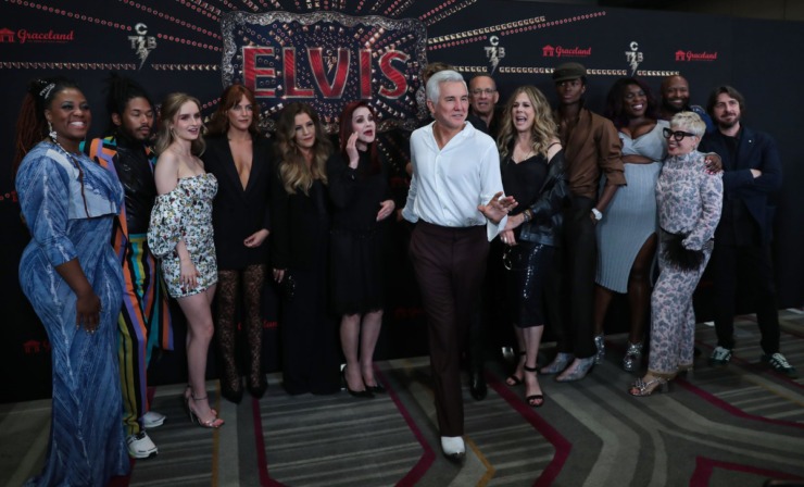 <strong>Director Baz Luhrmann jokes with reporters during a photo shoot Saturday with the "Elvis" cast at the Guesthouse at Graceland.</strong> (Patrick Lantrip/The Daily Memphian)